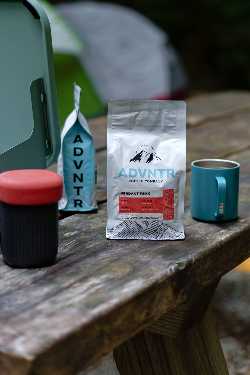 adventure camping coffee table with mugs and aerpress